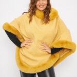 PONCHO CON PIEL