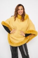 PONCHO CON PIEL