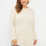 SWEATER CON LINEA Y TAJOS
