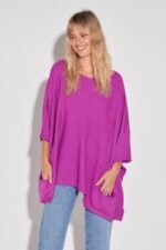 PONCHO CON DETALLE Y BOLSILLOS