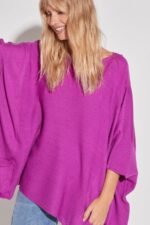 PONCHO CON DETALLE Y BOLSILLOS - Image 5