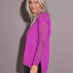 SWEATER CON DETALLES MANGAS LUREX