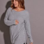 SWEATER CON BOTONES A LOS LADOS