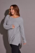 SWEATER CON BOTONES A LOS LADOS