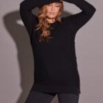 SWEATER CON BOTONES A LOS LADOS
