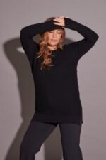 SWEATER CON BOTONES A LOS LADOS