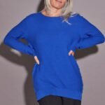 SWEATER CON BOTONES A LOS LADOS