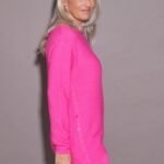 SWEATER CON BOTONES A LOS LADOS